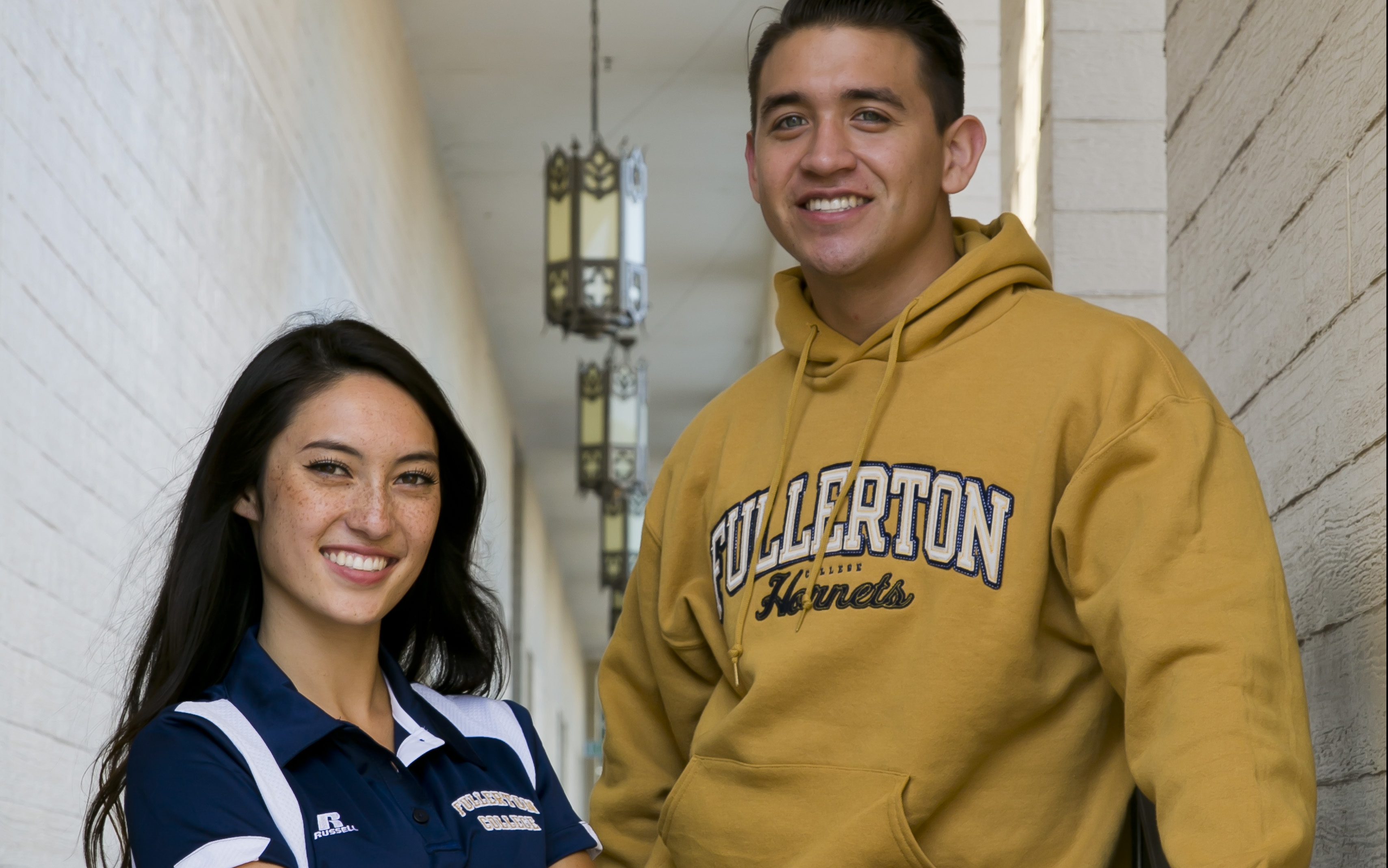 Fullerton College students proudly sporting Hornets gear.